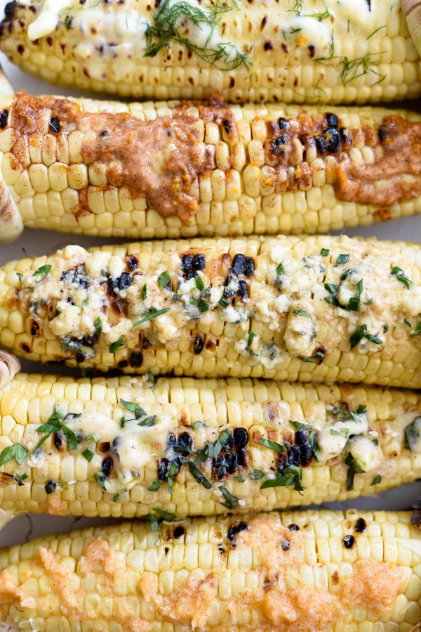 ears of grilled corn with butter