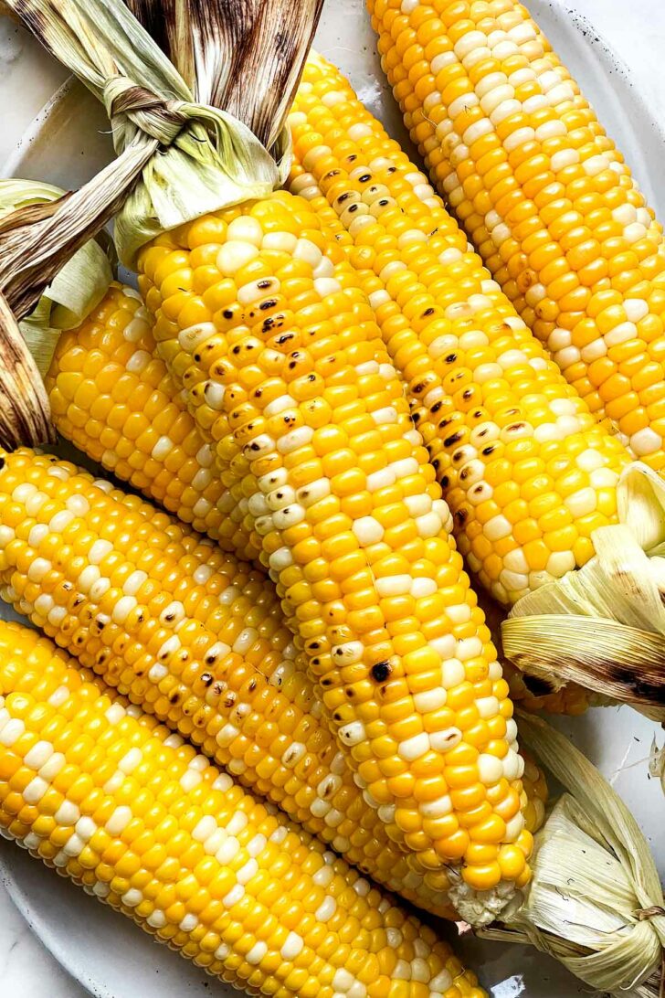 Grilled Corn on the Cob on platter foodiecrush.com
